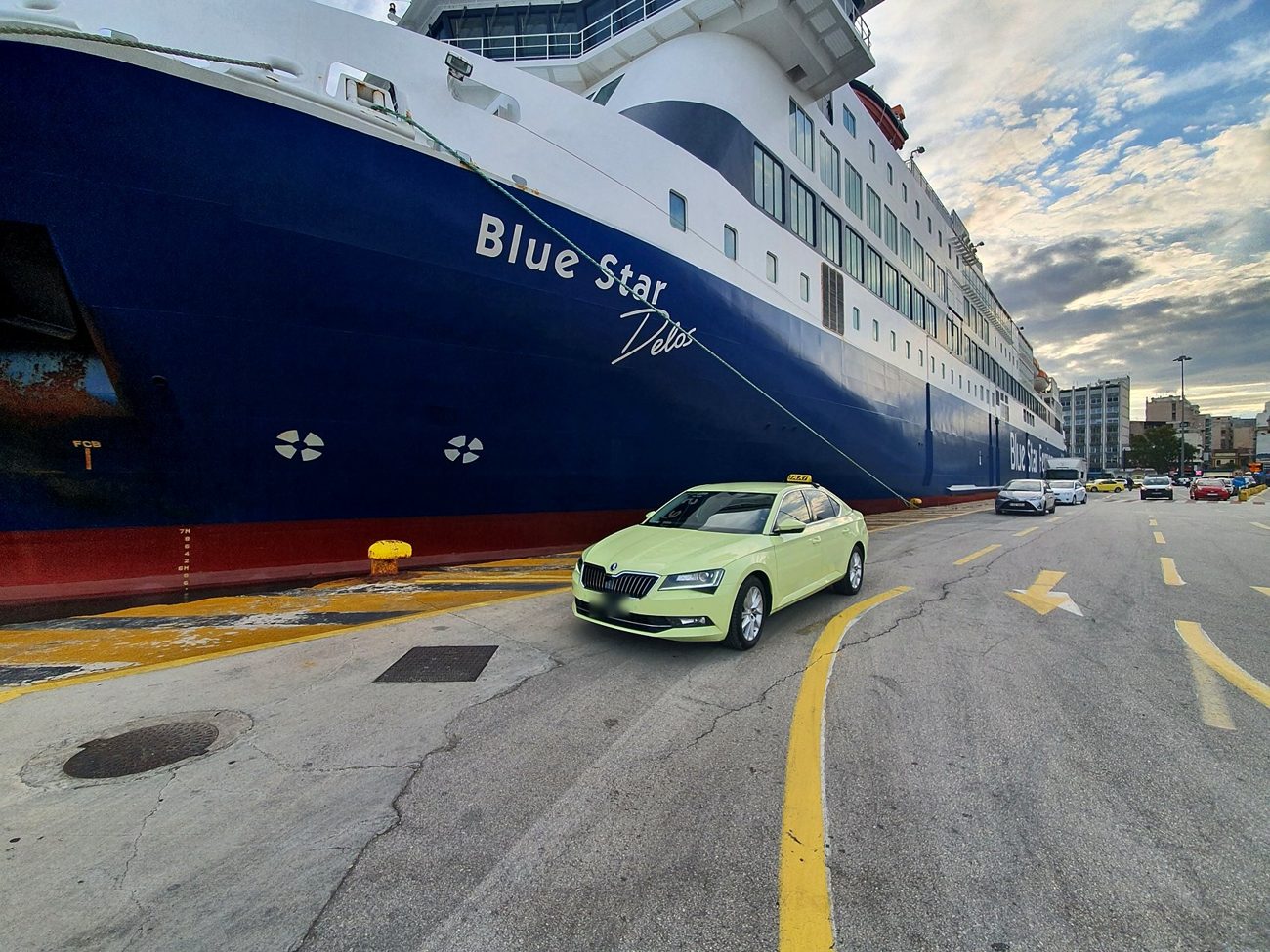 Taxi next to Blue Star ferry in Piraeus