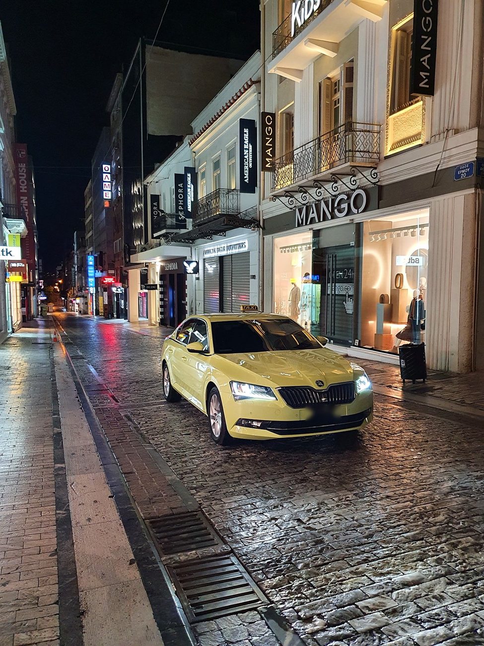 Taxi on Ermou street at night